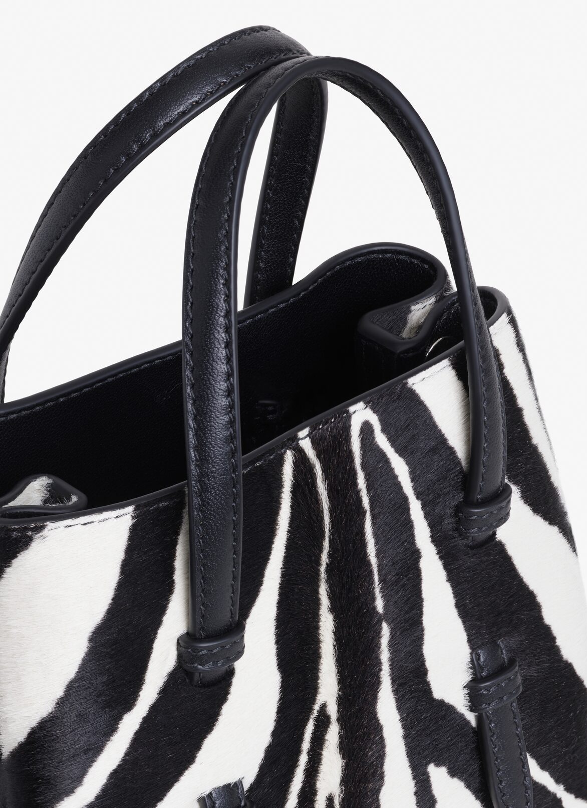 MINA 16 BAG IN ZEBRA PRINT ON HAIRY CALFSKIN ALAÏA BLACK MINA 16 BAG IN ZEBRA PRINT ON HAIRY CALFSKIN